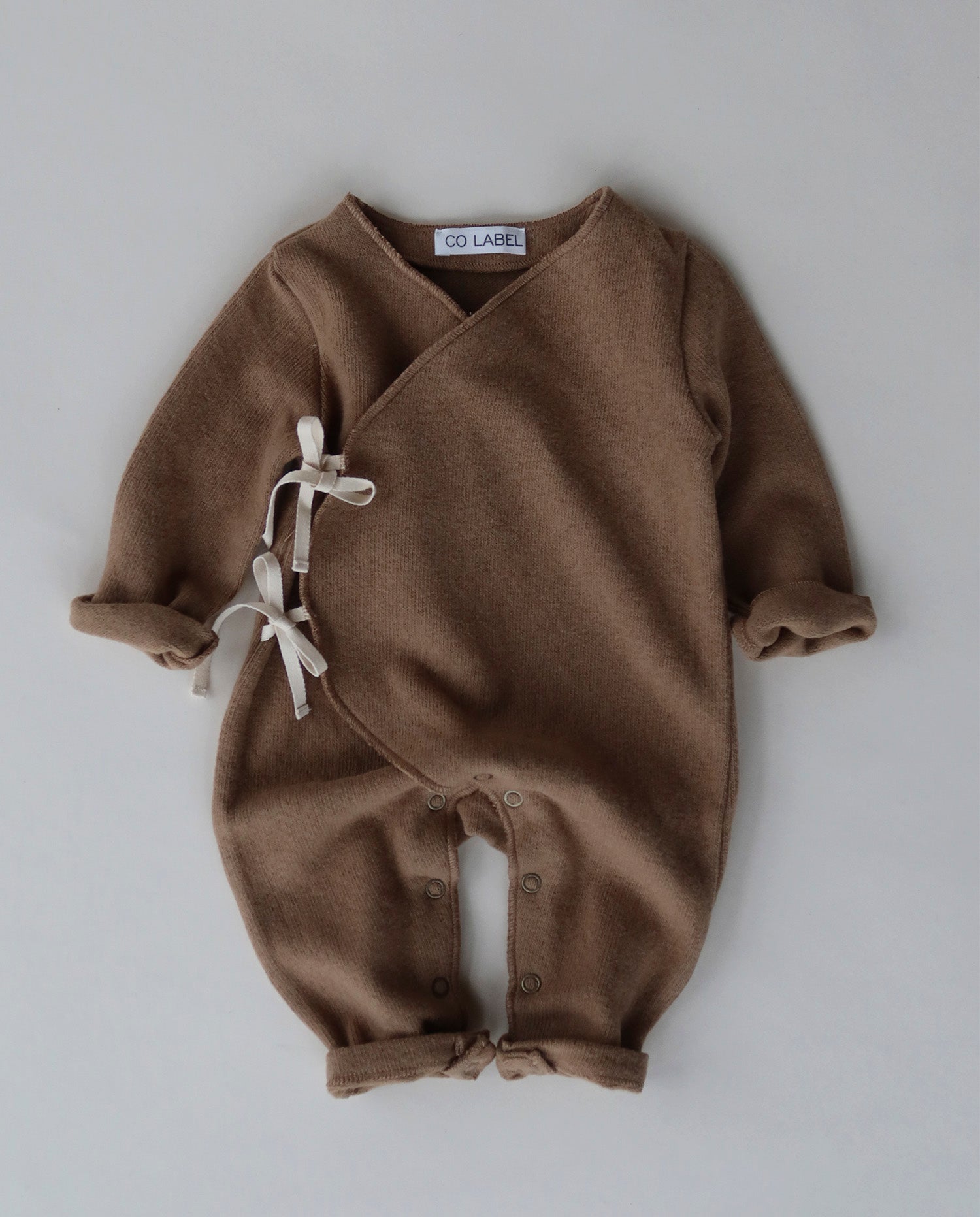 WARM EDDIE BABYSUIT - CO LABEL